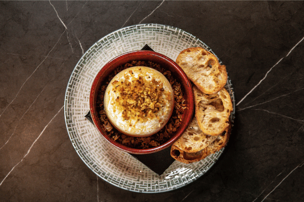 Baked camembert with herb crust and dipping bread: Moonee Ponds Restaurant, A La Carte Dining at The Sebel Melbourne Moonee Ponds | Saros Bar + Dining