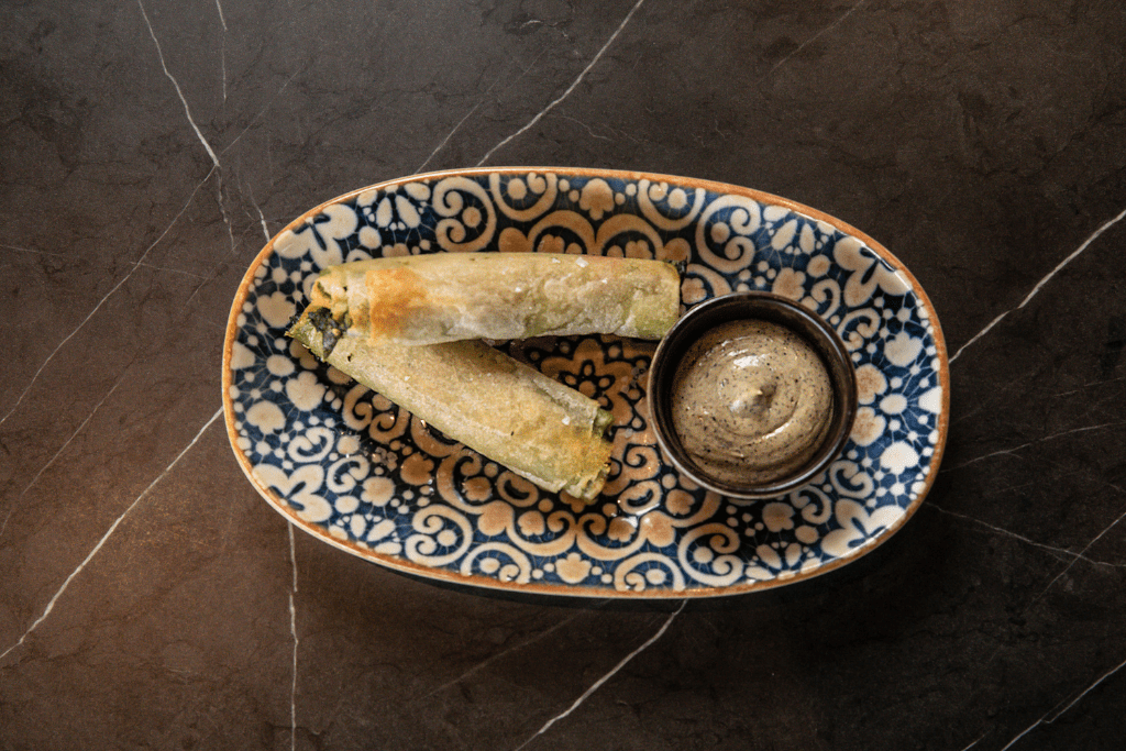 Brik pastry cigars filled with spinach and gruyere, charcoal aioli: Moonee Ponds Restaurant, A La Carte Dining at The Sebel Melbourne Moonee Ponds | Saros Bar + Dining