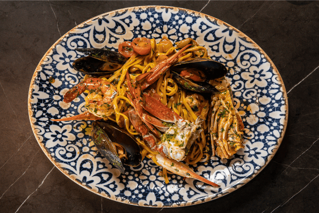 Saffron linguini, slipper lobster, blue swimmer crab, mussels, prawns, fresh tomato: Moonee Ponds Restaurant, A La Carte Dining at The Sebel Melbourne Moonee Ponds | Saros Bar + Dining
