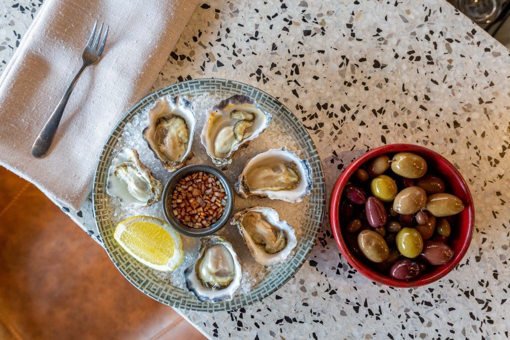 Freshly Shucked Seasonal Oysters (GF) With Lemon And Mignonette Dressing | Moonee Ponds Restaurant and Bar, A La Carte Dining at The Sebel Melbourne Moonee Ponds | Saros Bar + Dining