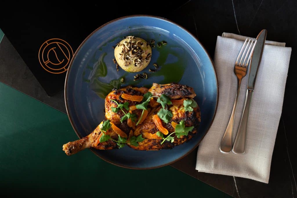 Grilled Bannockburn Half Chicken (GF) 42 Vadouvan Curry Paste, Hummus, Dried Apricot, Puffed Wild Rice | Moonee Ponds Restaurant and Bar, A La Carte Dining at The Sebel Melbourne Moonee Ponds | Saros Bar + Dining